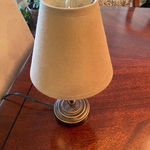 Small decorative accent lamp with shade